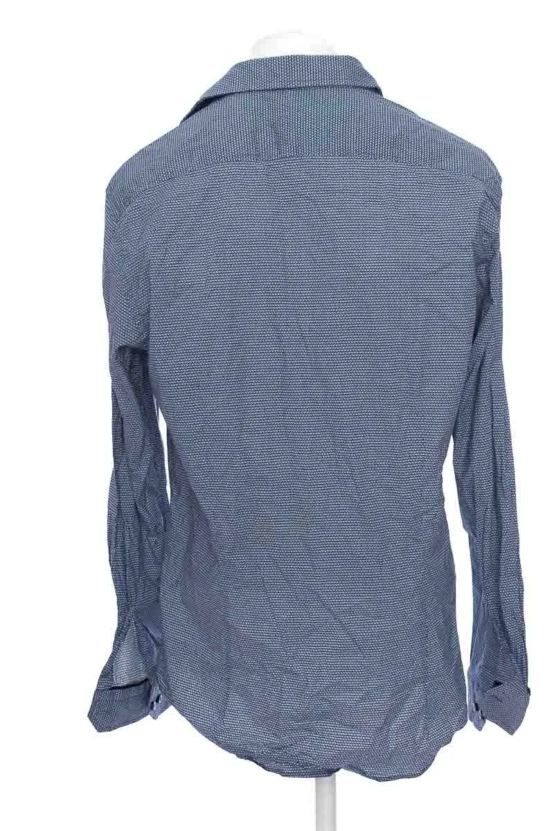 CAMISA COLOR AZUL  ARTURO CALLE