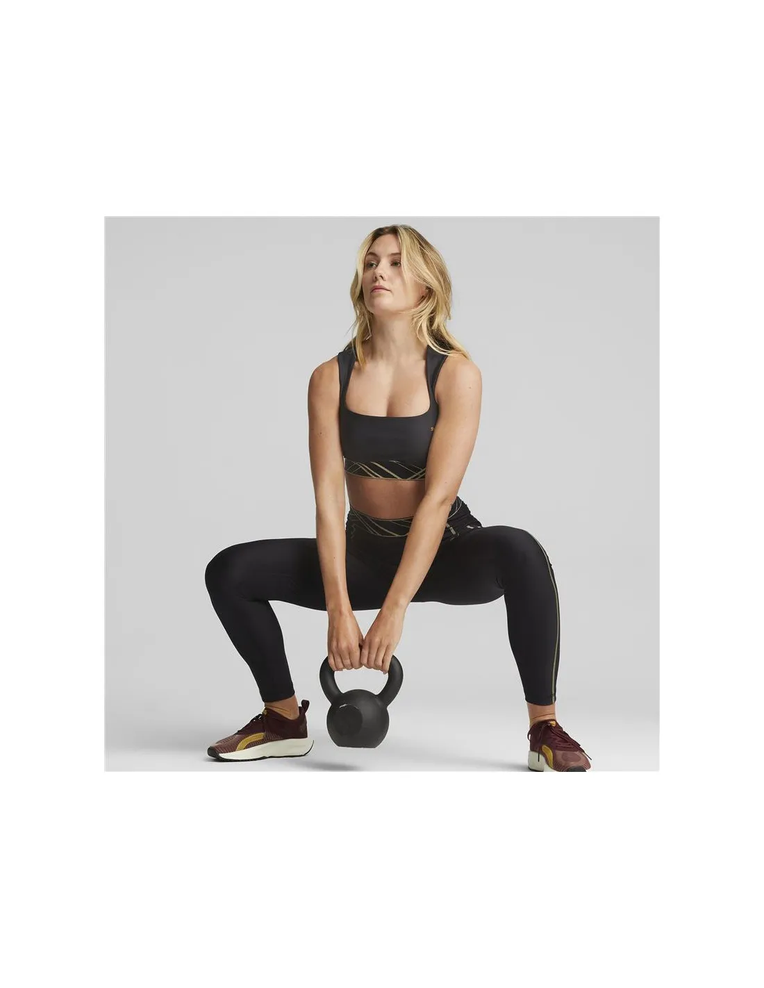Sujetador deportivo de traning Puma Mid Impact Deco Glam negro Mujer