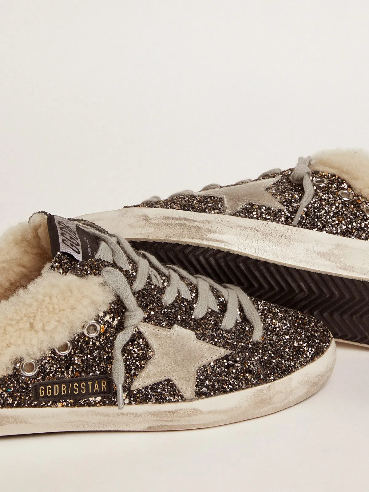 SUPERSTAR SABOT PARA MUJER CON PURPURINA E INTERIOR DE SHEARLING