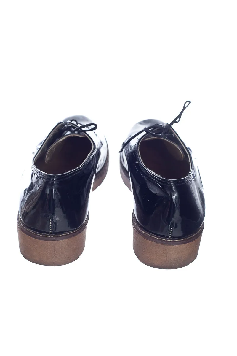 ZAPATOS COLOR NEGRO  AQUILES